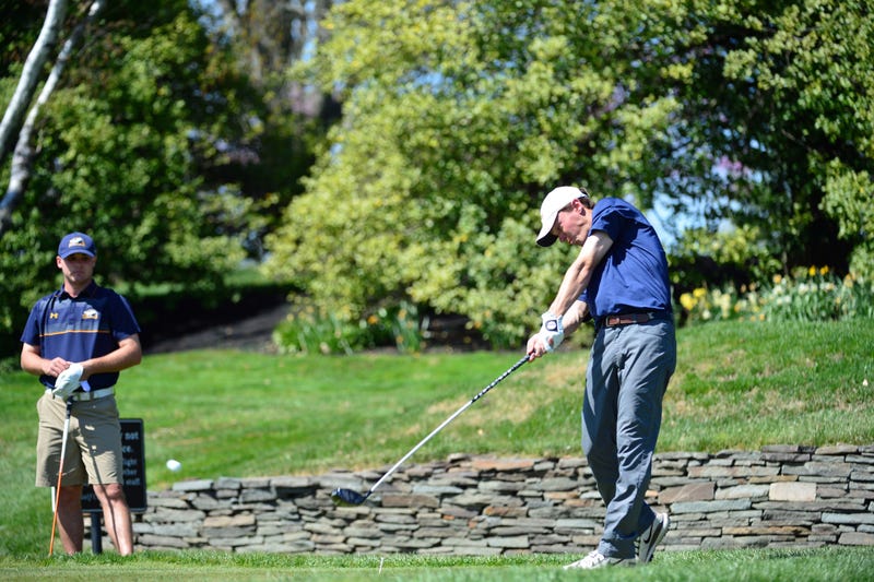 Pro golfer Chris Crawford (right) on the links.