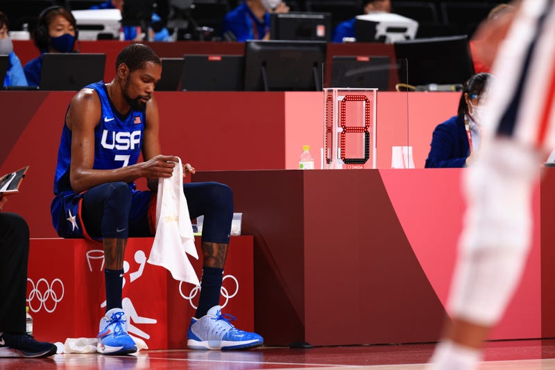 Kevin Durant the U.S. sits on the bench in disappointment as time winds down in the U.S. men's basketball team's loss to France at the Tokyo Olympics, 7/25/21