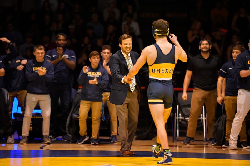 Matt Azevedo (center) has been the head wrestling coach for Drexel University since 2011.