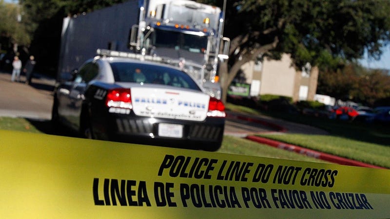 A police car and hazmat semi-trailer sit inside the The Village Bend East apartment complex where a second health care worker who has tested positive for the Ebola virus resides on October 16, 2014 in Dallas, Texas. 