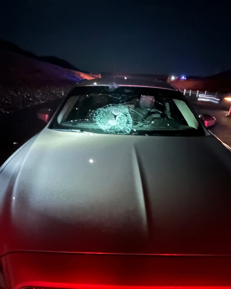 Car damaged by a rock thrown onto I-11 on August 10th, 2025