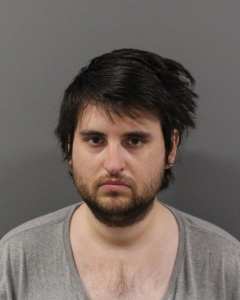 Darius Burke, 27, of Manchester, accused of issuing a threat against Manchester Community College