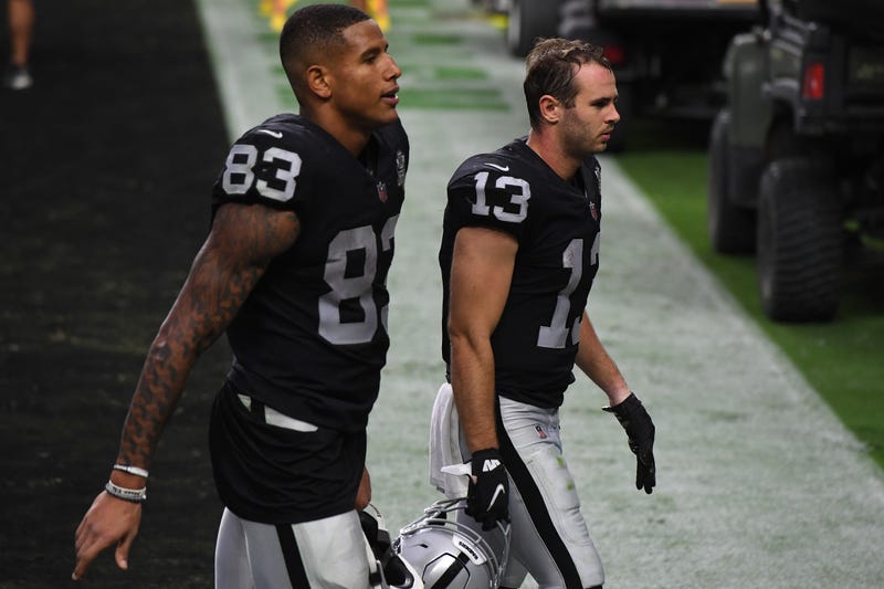 Raiders TE Darren Waller & WR Hunter Refrow leave the field after a game