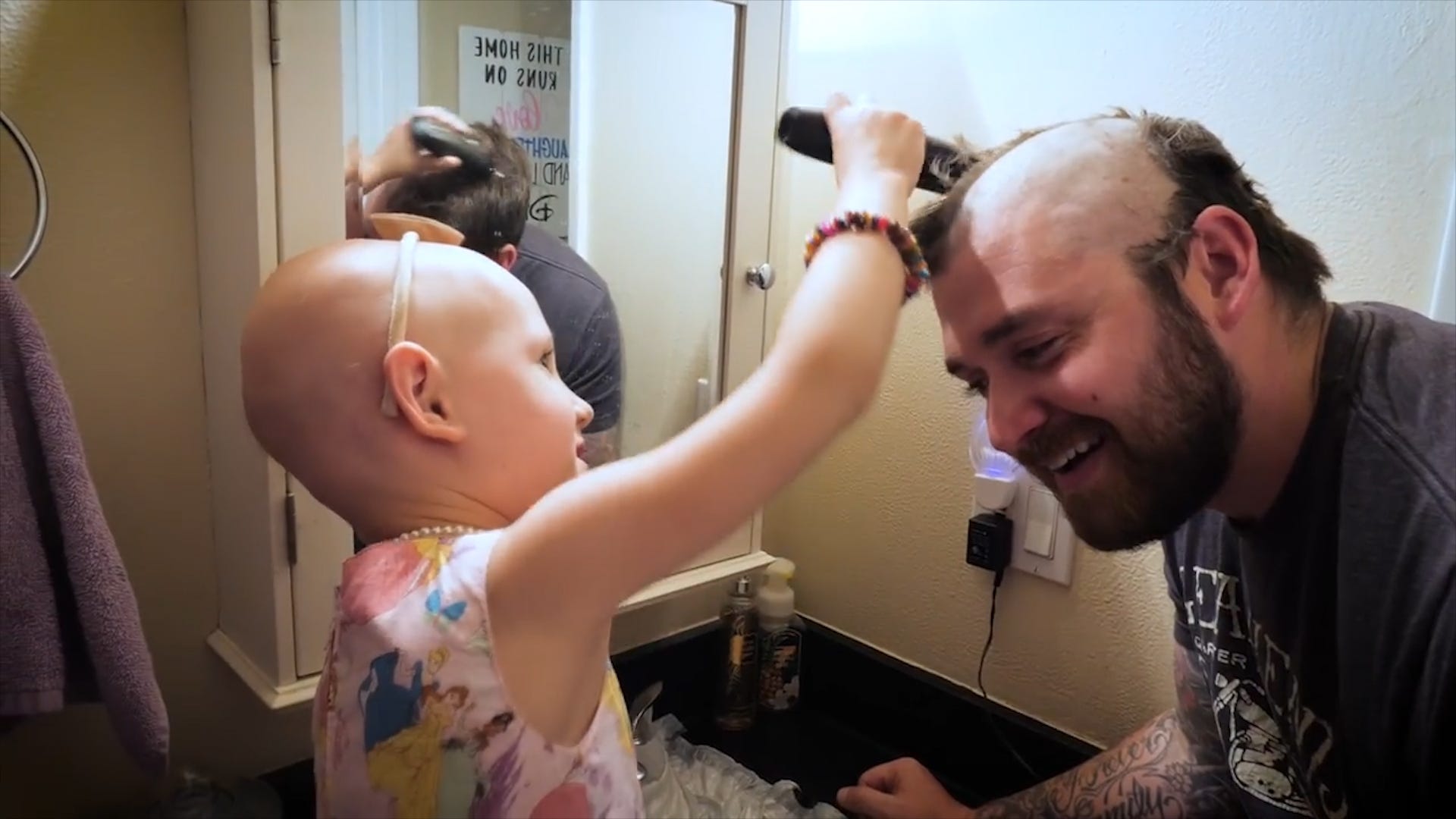 5-Year-Old Girl with Alopecia Gets Confidence Back After Dad Shaves His Head To Match Hers
