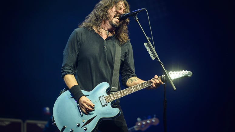 Dave Grohl Has Fun with Drunk Stage-Crasher