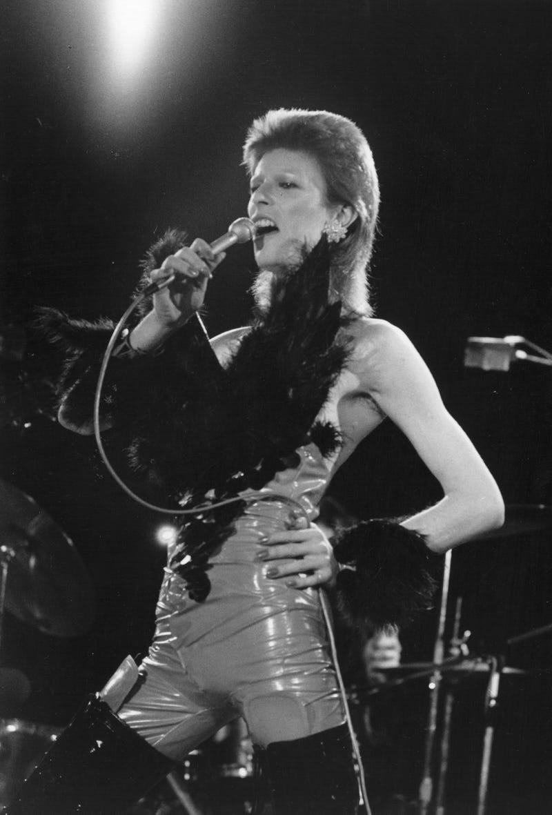 David Bowie (1947 - 2016) performing at a live recording of 'The 1980 Floor Show' for the NBC 'Midnight Special' TV show, at The Marquee Club in London, with a specially invited audience of Bowie fanclub members, 20th October 1973. Bowie is wearing his 'Angel of Death' costume.