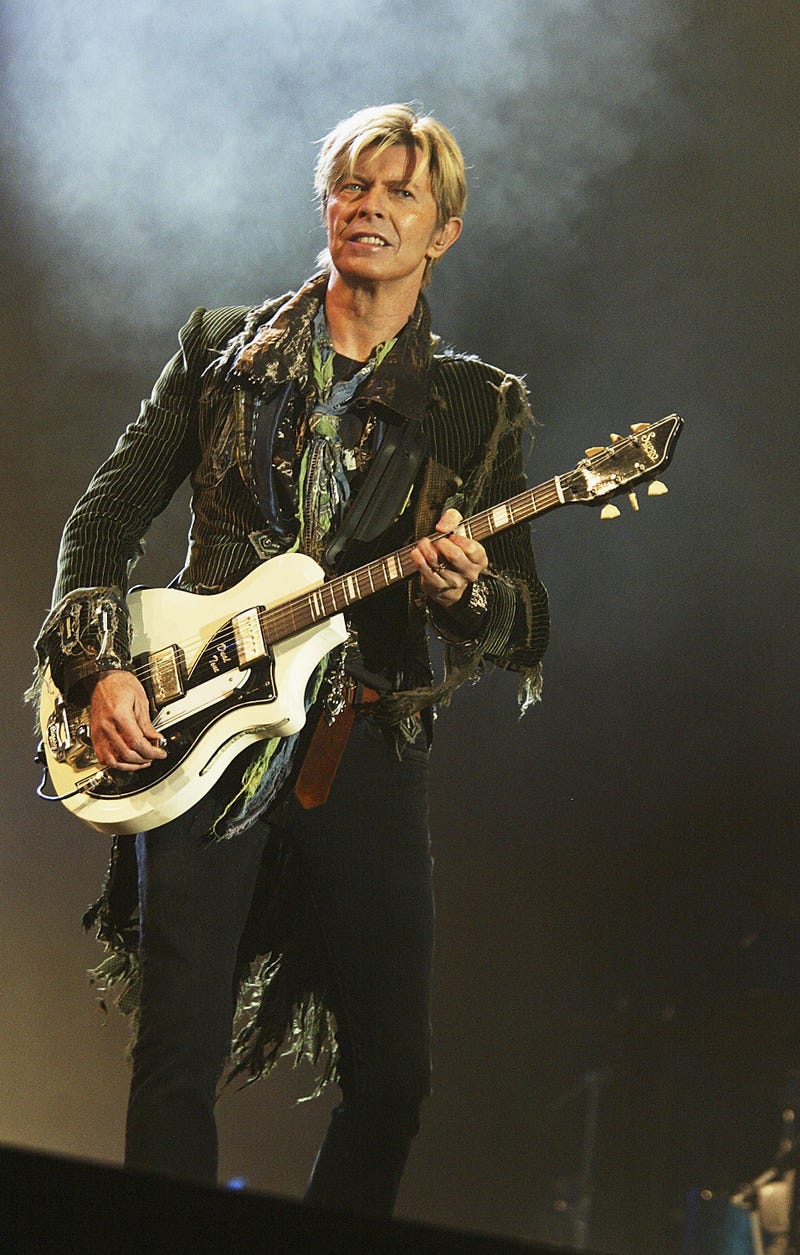 David Bowie performs on stage on the third and final day of "The Nokia Isle of Wight Festival 2004" at Seaclose Park, on June 13, 2004 in Newport, UK. The third annual rock festival takes place during the Isle of Wight Festival which runs from June 4-19.