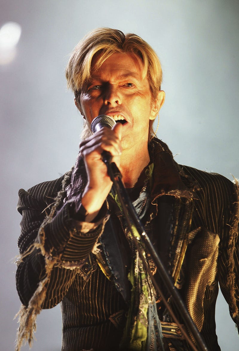 David Bowie performs on stage on the third and final day of "The Nokia Isle of Wight Festival 2004" at Seaclose Park, on June 13, 2004 in Newport, UK. The third annual rock festival takes place during the Isle of Wight Festival which runs from June 4-19.