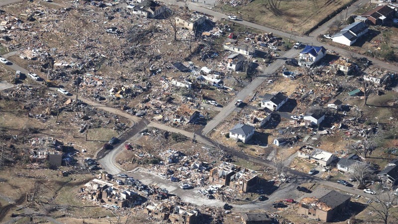 In this aerial view, homes and surrounding area are heavily damaged after they were hit by a tornado three days prior, on December 13, 2021 in Dawson Springs, Kentucky. Multiple tornadoes struck several Midwest states late evening on December 10, causing widespread destruction and multiple casualties.