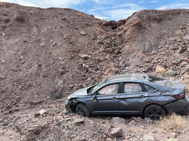 A vehicle of a man who died from heat-related complications lies damaged in Death Valley.