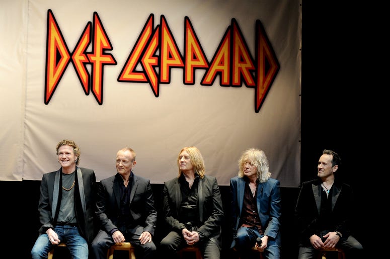 Rick Allen, Phil Collen, Joe Elliott, Rick Savage and Vivian Campbell of Def Leppard 