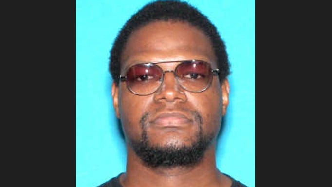 Police searching for man suspected in murder of woman at Detroit Travel Inn hotel