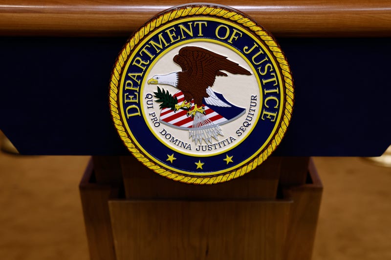 A seal for the Department of Justice is seen on a podium ahead of a news conference with U.S. Attorney General Merrick Garland at the Department of Justice Building on March 21, 2024 in Washington, DC. 