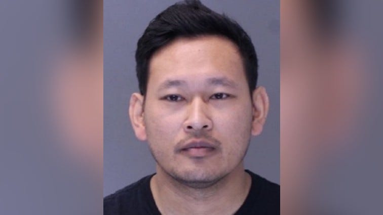 Mugshot of Deren Thach