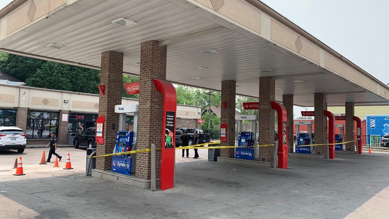 Police tape at Mobil gas station