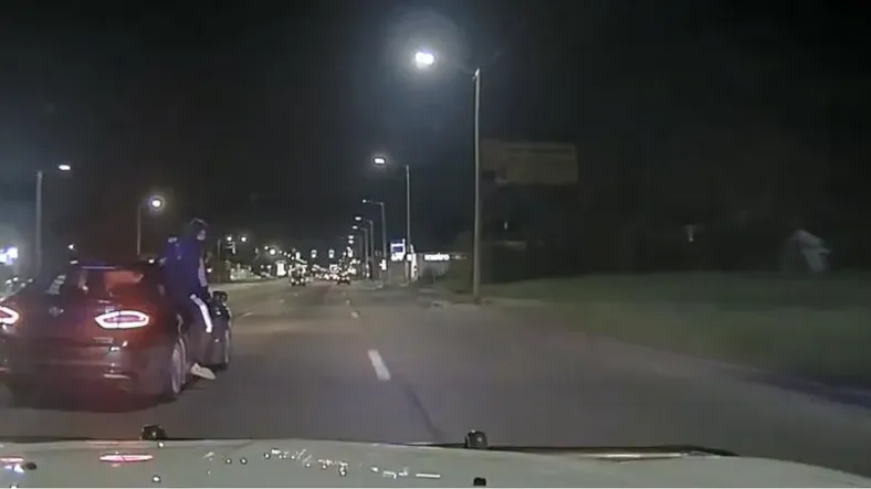 DPD searching for 'incredibly callous' drag racing suspects who hung out of car, fired at police officers