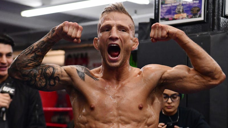 T.J. Dillashaw poses during an open workout before his UFC fight against Henry Cejudo.