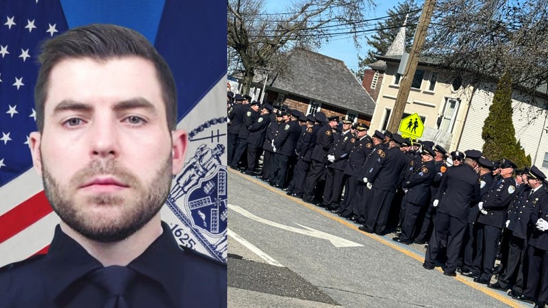 Police officers attend the funeral of fallen Officer Jonathan Diller on Saturday morning.