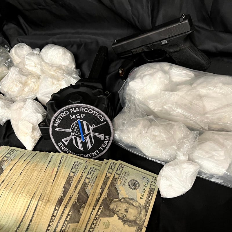 Drugs, guns and money seized in Downriver raids