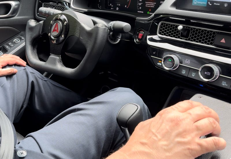 WWJ AutoBeat Reporter Jeff Gilbert drives Hitachi Astemo test car with mouse