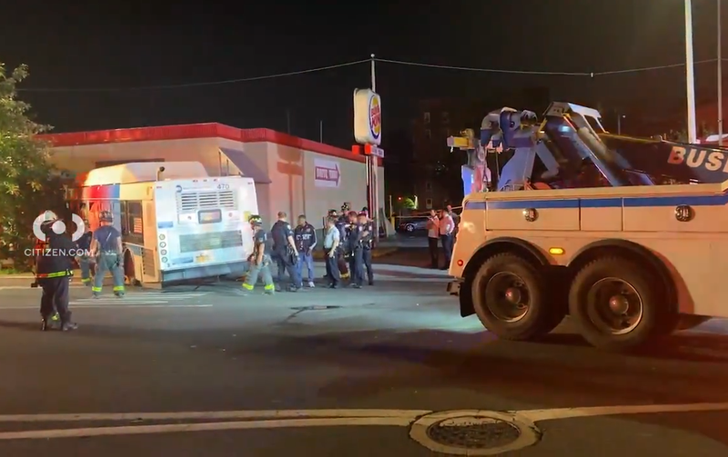 The front end of the bus was inside of the Burger King, video shows
