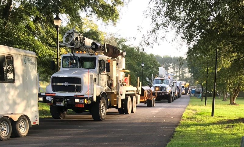 Duke Energy crews depart their operations center in Florence, SC