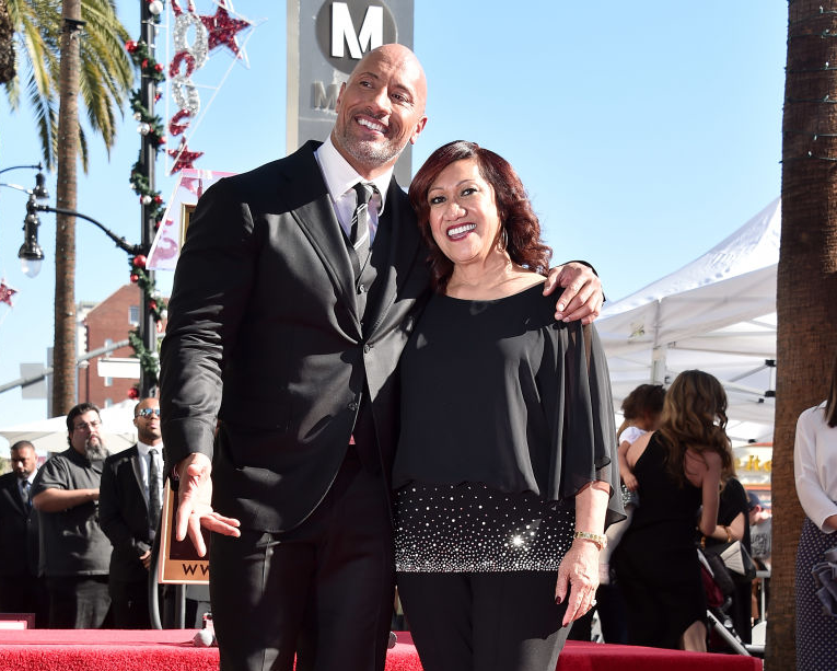 Actor Dwayne Johnson and mother Ata Johnson attend a ceremony honoring Dwayne Johnson with the 2,624th star on the Hollywood Walk of Fame on December 13, 2017 in Hollywood, California