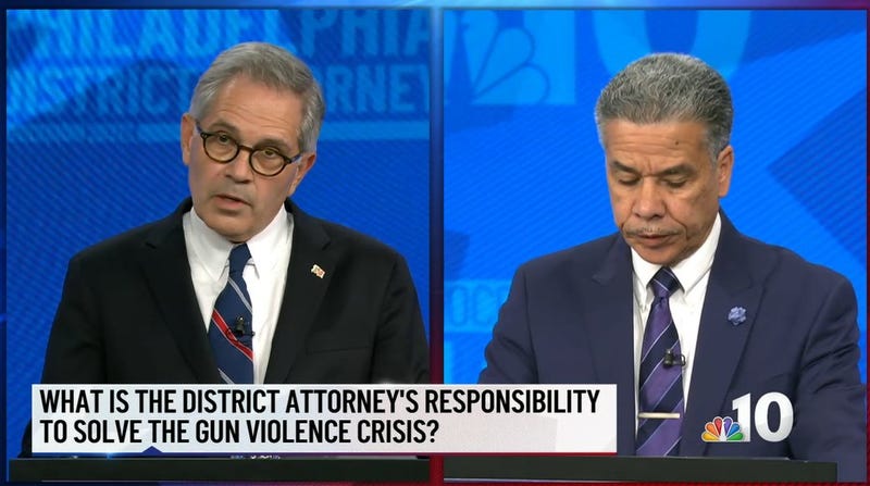 Incumbent Larry Krasner (left), challenger Carlos Vega during their debate for the Democratic primary for Philadelphia District Attorney.