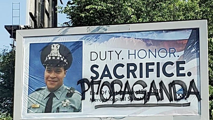 Billboard memorializing officer killed in line of duty vandalized, to be replaced
