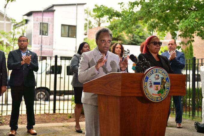 Governor JB Pritzker and Mayor Lori Lightfoot announced Monday new job development and housing programs for Chicago's West Side; but they did not do it together, despite being in the same neighborhood.