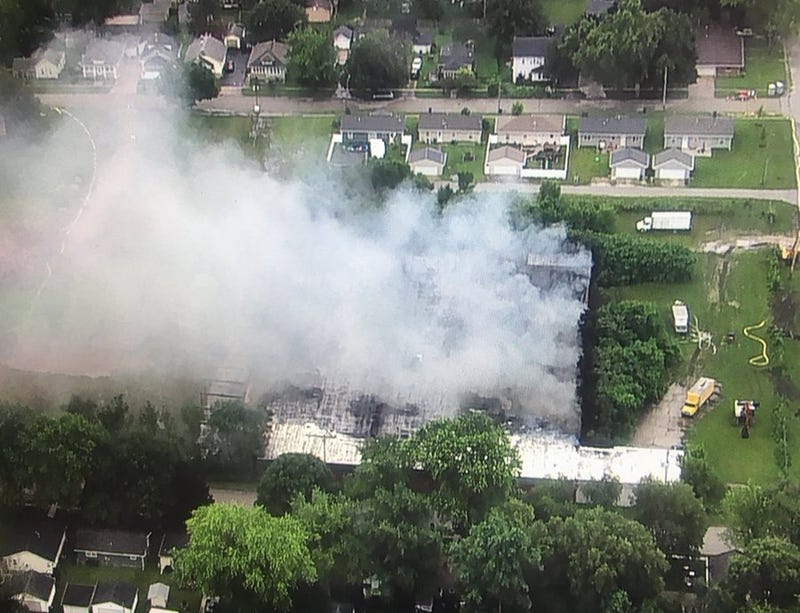 Fire continues to burn in the 900 block of Benton St. in Morris
