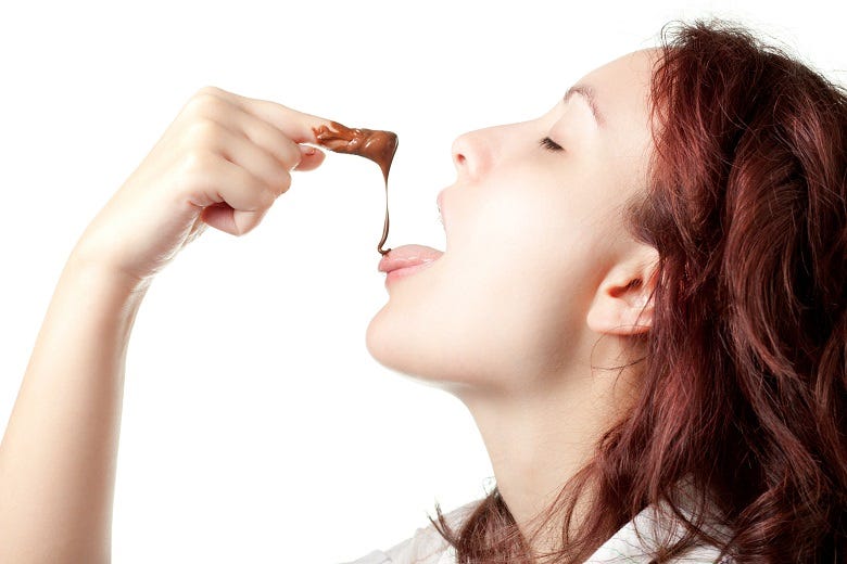 Woman eating with fingers