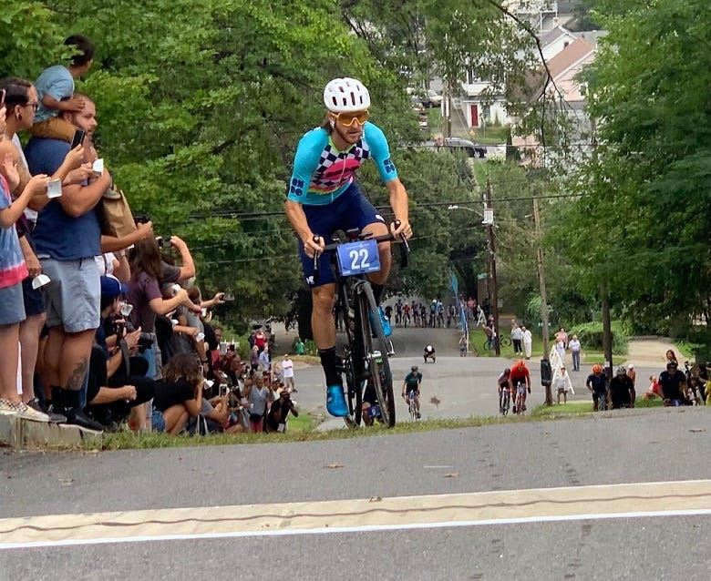 cyclist at top of hill