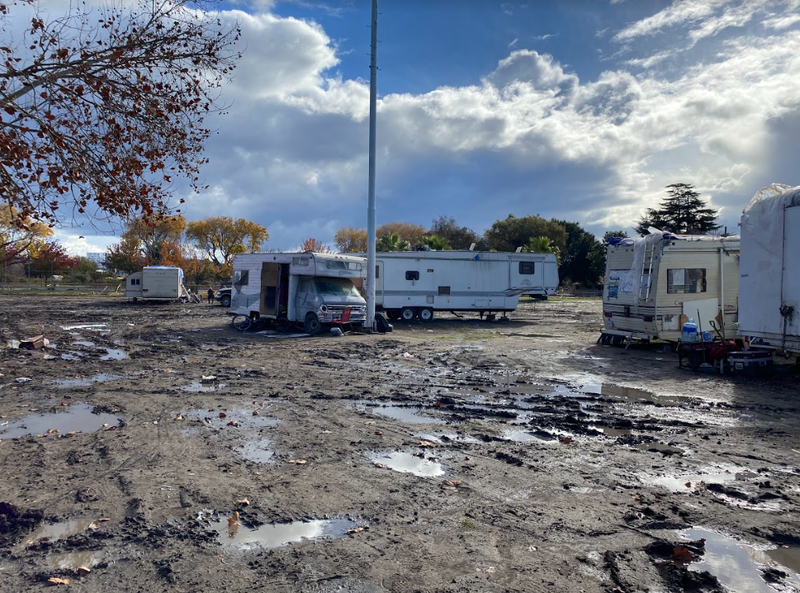 Some residents and their trailers still remain at the encampment.