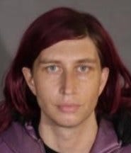 Eric Cohen, 30, was arrested and booked on a charge of attempted murder related to a stabbing at an anti-vaxxer protest and counterprotest. 
