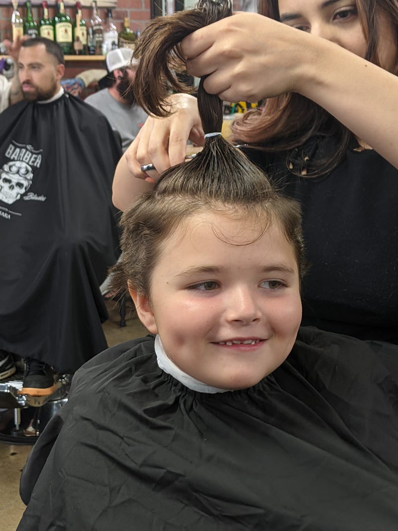 Ezra getting his hair cut