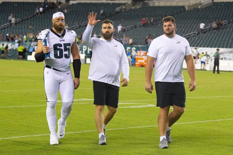 Lane Johnson #65, Jason Kelce #62, and Landon Dickerson #69 of the Philadelphia Eagles walk off the field after the preseason game against the New York Jets at Lincoln Financial Field on August 12, 2022 in Philadelphia, Pennsylvania.