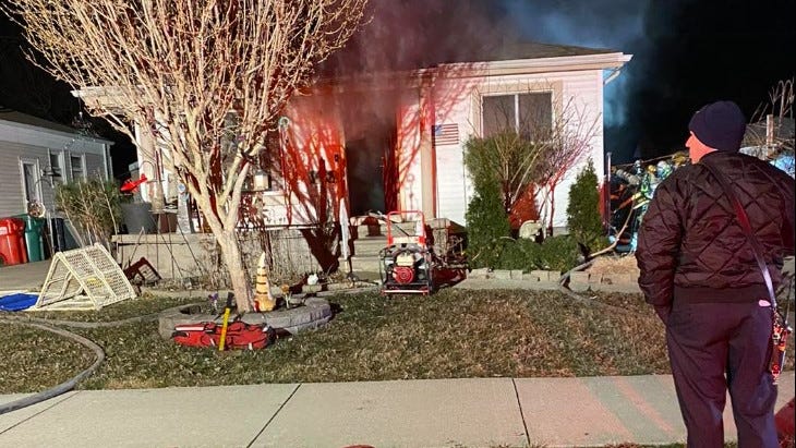 Crews rescue 14 puppies, adult dog from basement of burning Eastpointe home