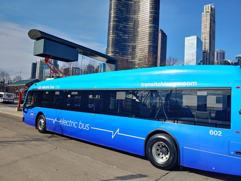 Electric buses at the quick-charging station at Navy Pier. In about five to ten minutes, these in-route stations can charge a bus for about 8% to 10% of their capacity.