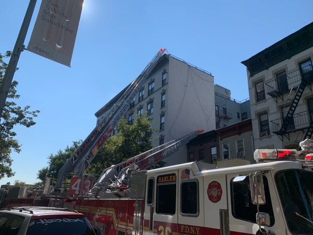 Members of the FDNY battle a fourth-floor fire at 438 120th St. in Harlem on Saturday morning, Sept. 4, 2021.