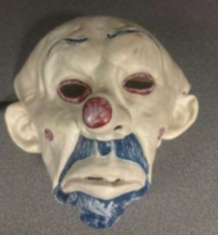 Clown mask, money, gun