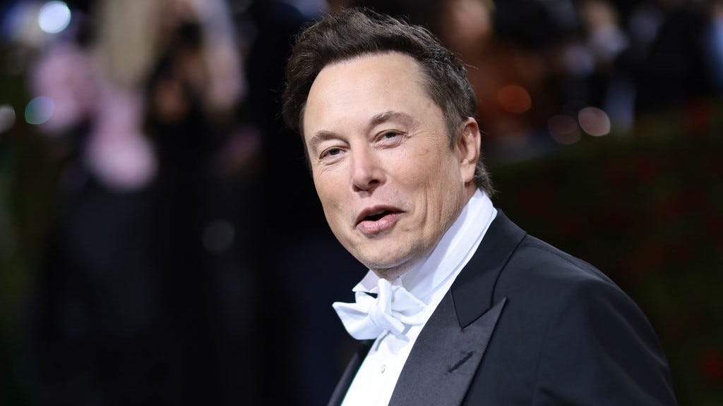 Elon Musk says he would 'reverse the permanent ban' of Donald Trump on Twitter