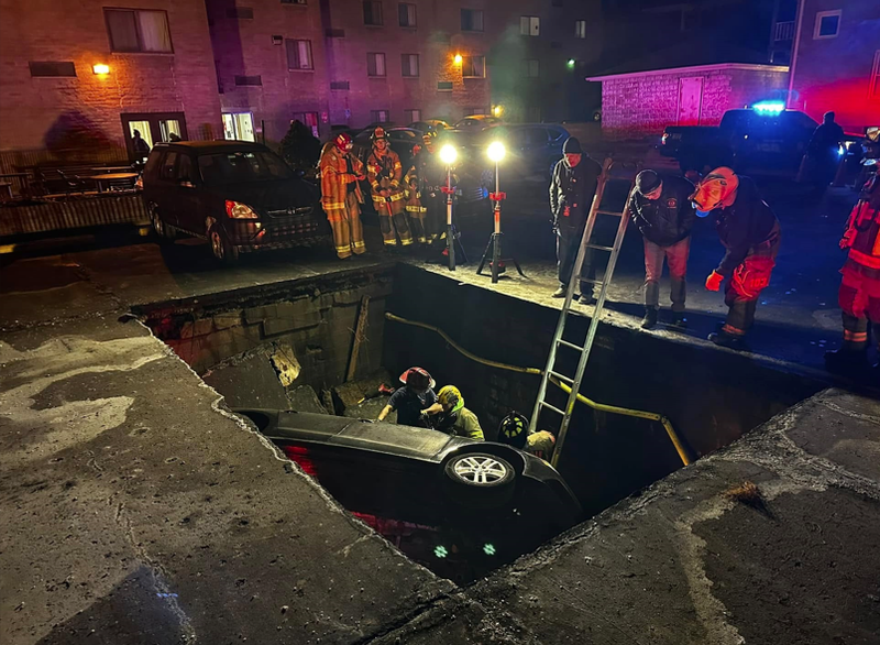 Car falls through parking garage in Bellevue