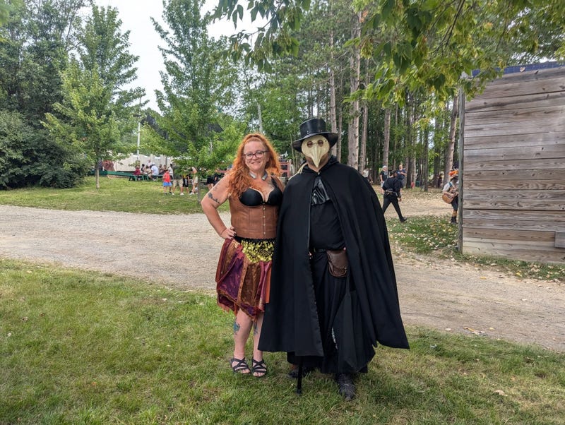 Jacob, at right, is seen in the costume he wore to the festival.