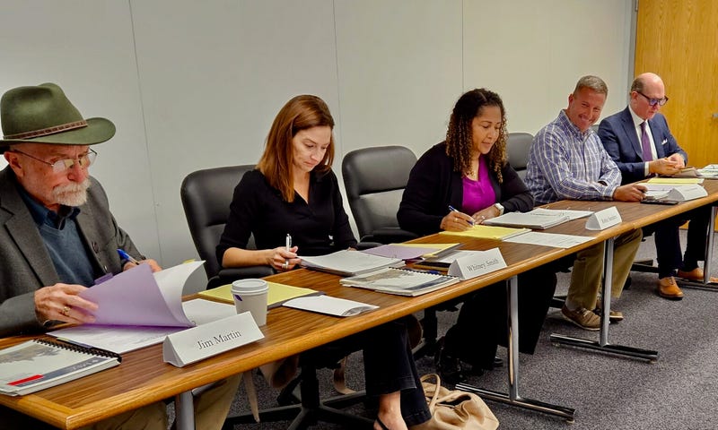 The Missouri Ethics Commission meeting Oct. 16 at its Jefferson City offices. Members at the time, from left, were Jim Martin, Whitney Smith, Robin Wheeler Sanders and Jeremy Schneider. Attorney Scott Pool, the commission’s counsel, is at the far right.
