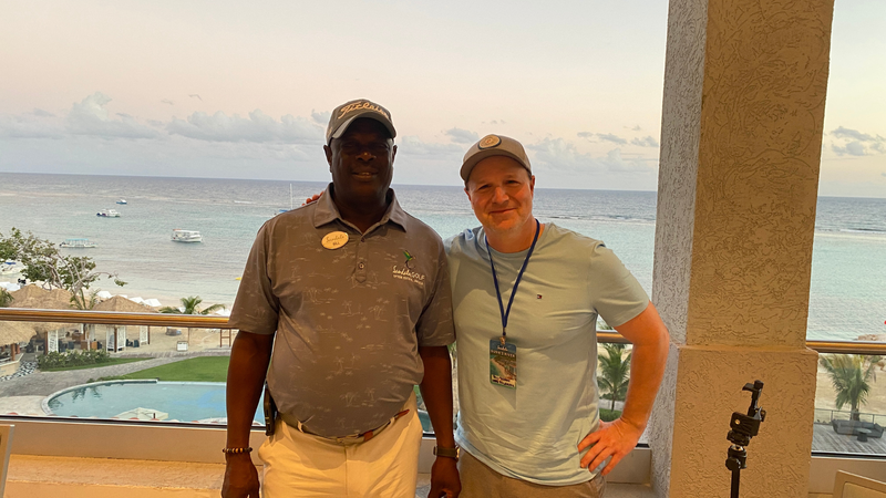 Bill Tafrow chats with Bill Williams, Golf Pro from Upton Estate Golf & Country Club at Sandals® Dunn's River