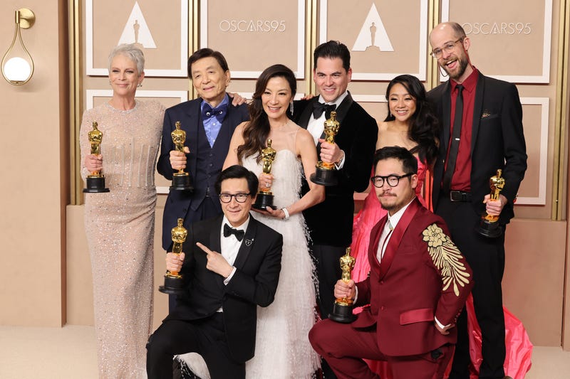 (L-R) Jamie Lee Curtis, James Hong, Ke Huy Quan, Michelle Yeoh, Jonathan Wang, Daniel Kwan, Stephanie Hsu, and Daniel Scheinert, winners of the Best Picture award for ’Everything Everywhere All at Once’ pose in the press room during the 95th Annual Academy Awards at Ovation Hollywood on March 12, 2023 in Hollywood, California.