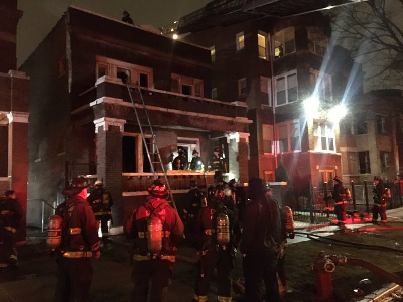 A Chicago firefighter fell through a floor while responding to a blaze Wednesday in Englewood on the South Side.
