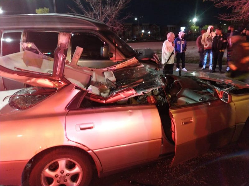 A woman was killed and at least three other people were injured in a crash Thursday night in West Town.