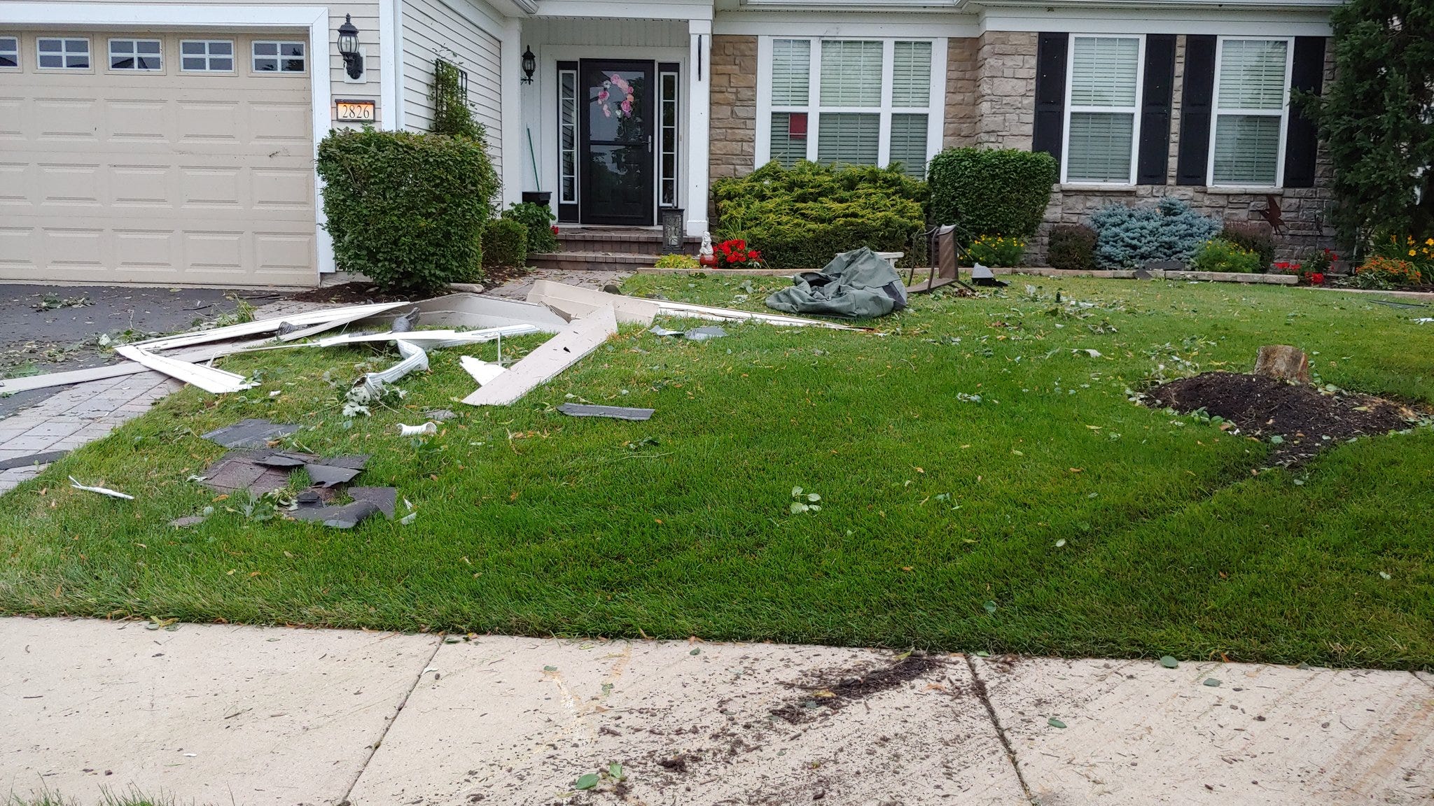 Suspected tornado rips through Elgin subdivision